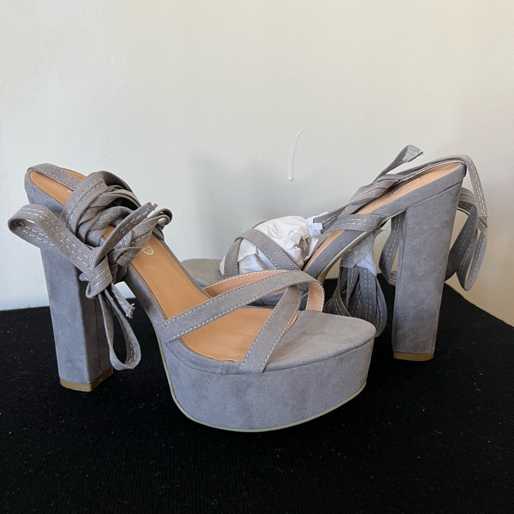 Grey platform chunky heels.